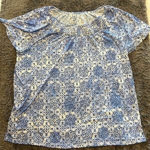 Blue and white patterned blouse